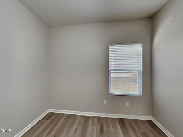 a view of a room that has a window