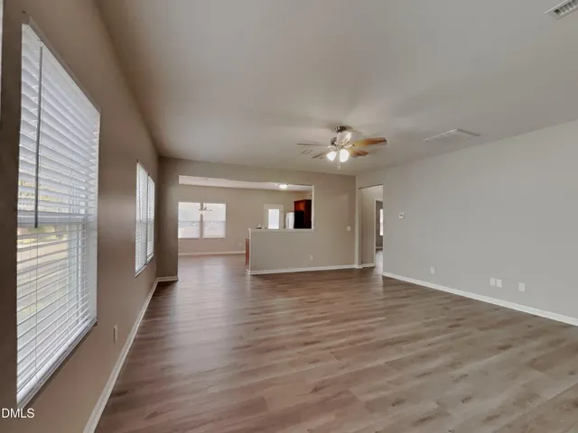 a view of livingroom and hardwood floor