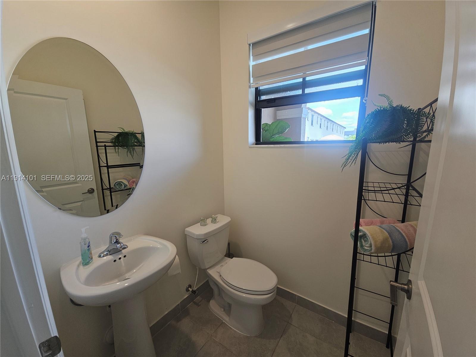 3310 West 114th Terrace Hialeah, FL 33018 - Photo 11 of 51 Half Bathroom