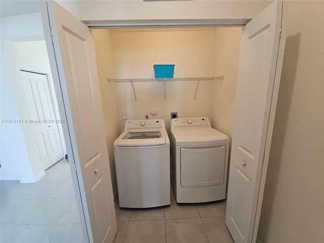 a view of a room with rack on the wall