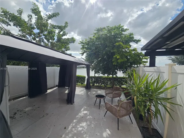 a view of a lake with outdoor space
