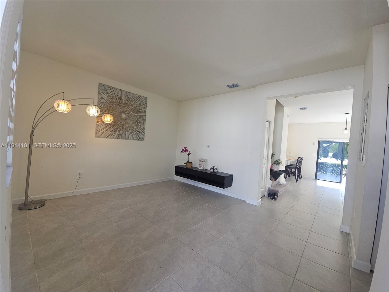 3310 West 114th Terrace Hialeah, FL 33018 - Photo 10 of 51 Family room