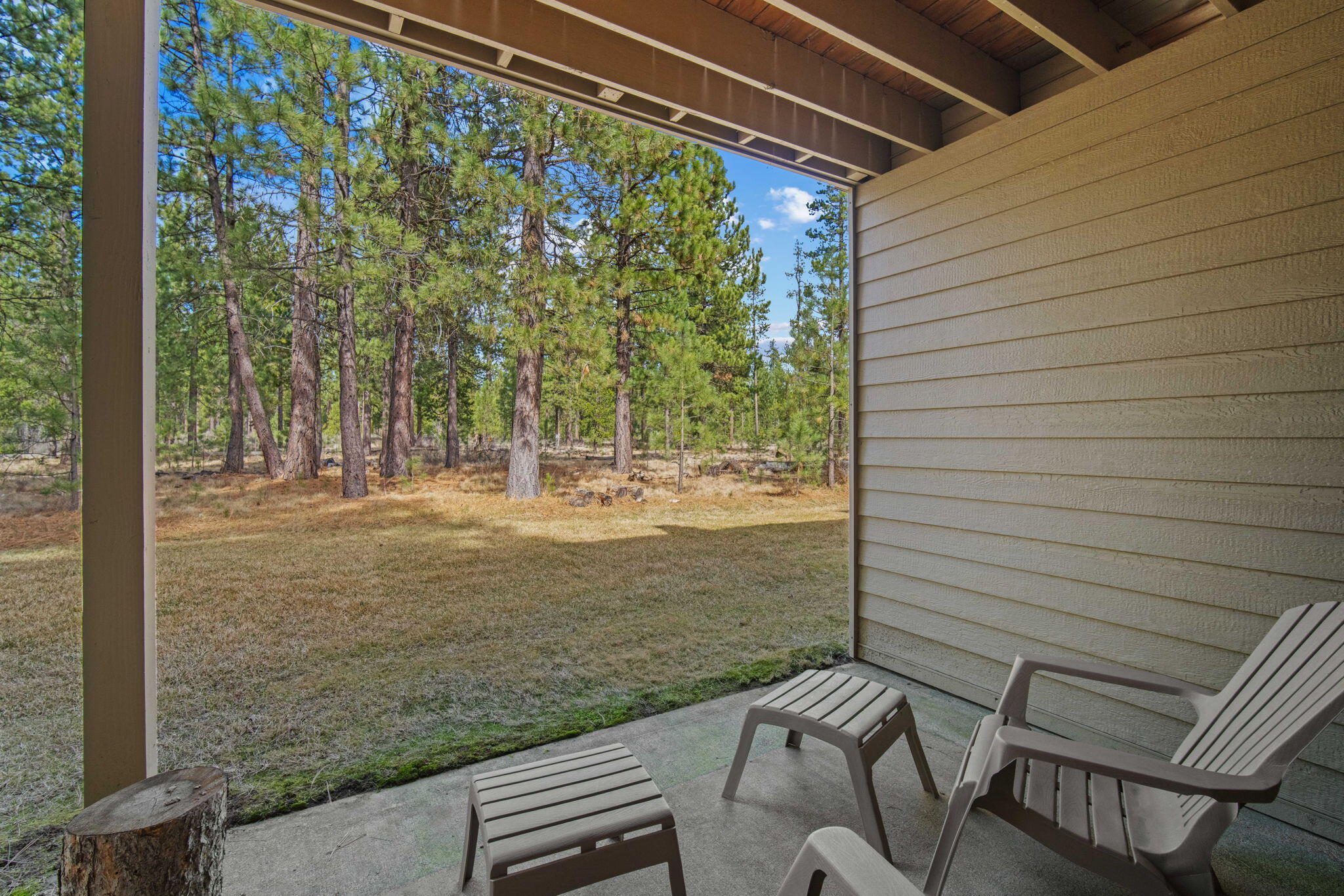 17682 Bittern Lane, Unit 31 Sunriver, OR 97707 - Photo 41 of 44 a view of a patio with two chairs and a table