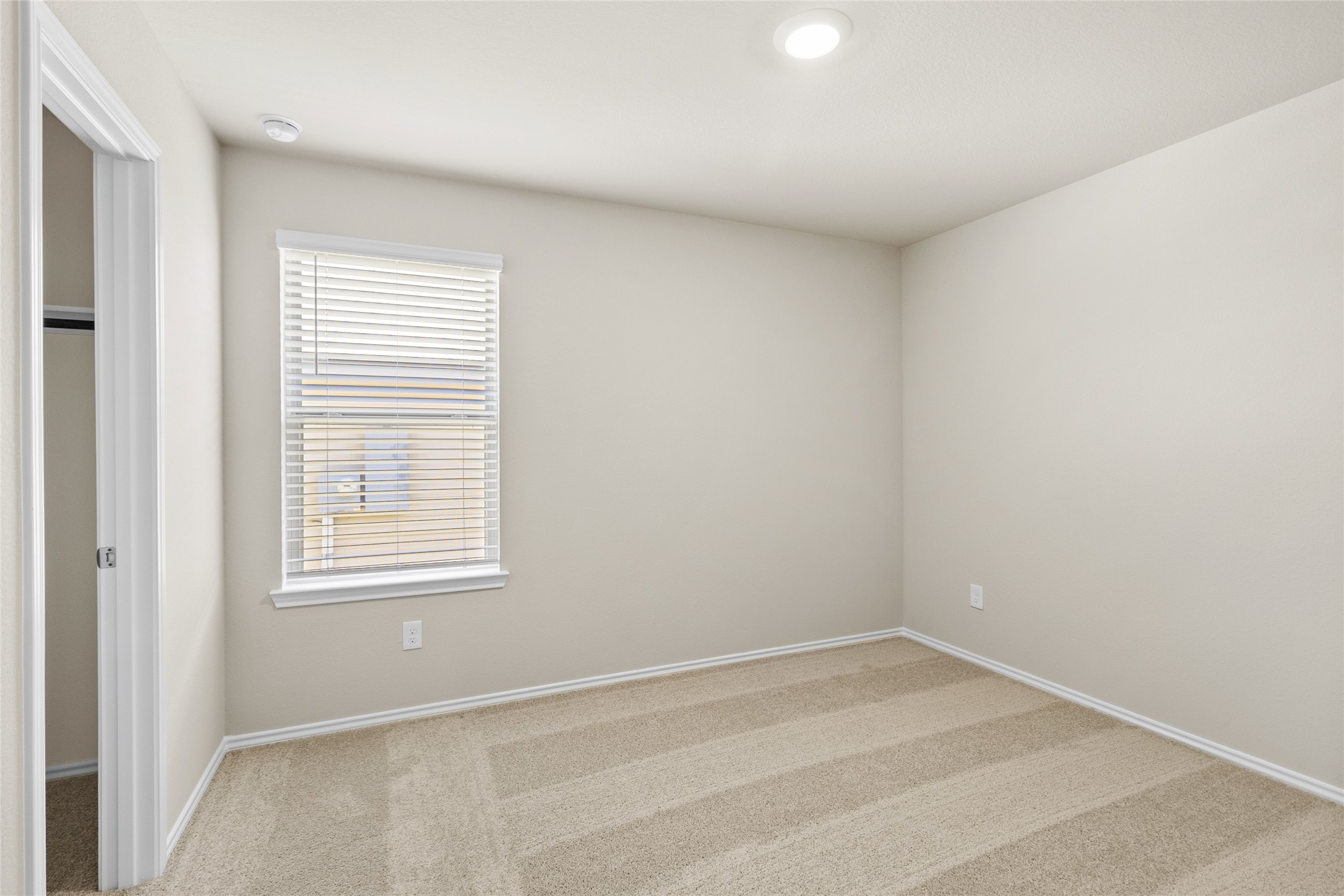206 Rockbridge Drive Huntsville, TX 77340 - Photo 12 of 15 an empty room with a window