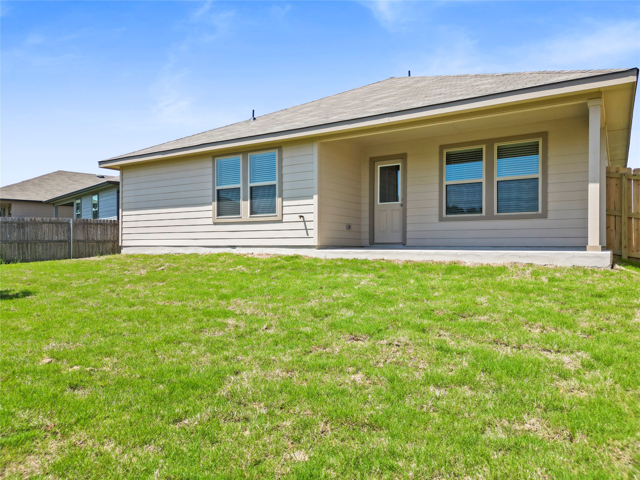 206 Rockbridge Drive Huntsville, TX 77340 - Photo 15 of 15 front view of house with a yard