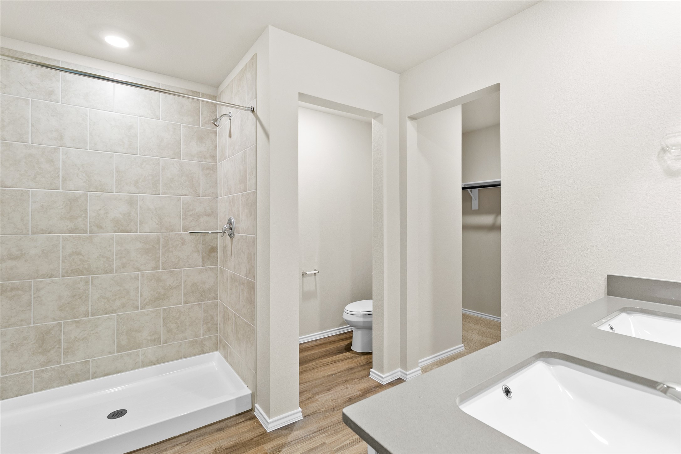 206 Rockbridge Drive Huntsville, TX 77340 - Photo 6 of 15 a bathroom with a sink a toilet and shower