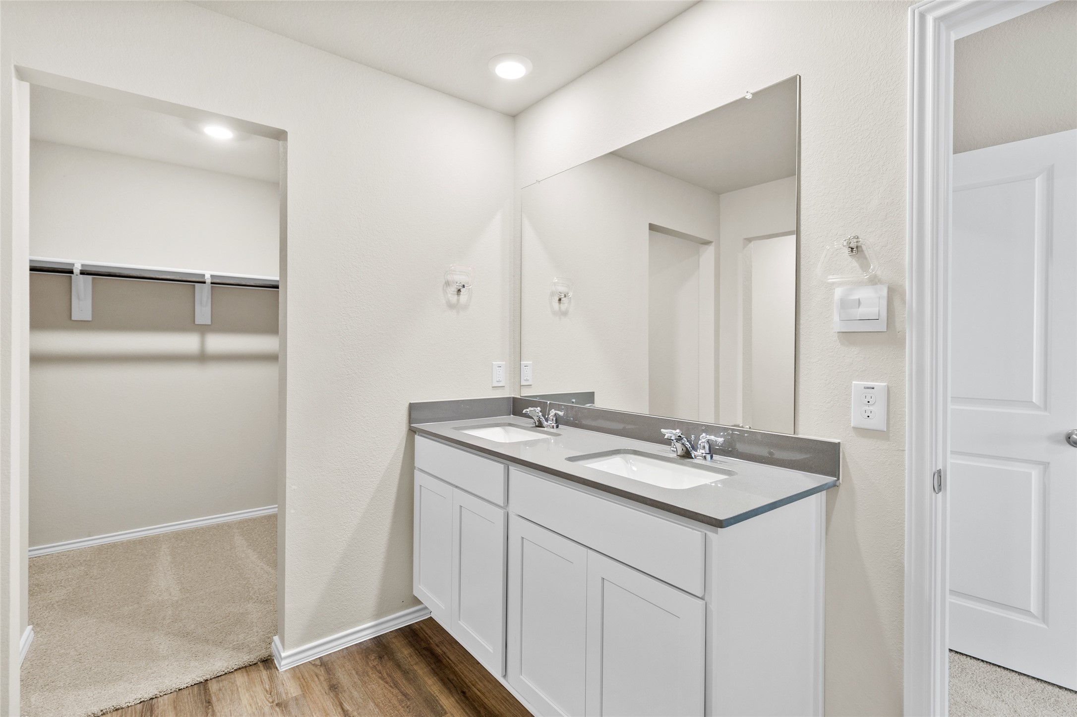 206 Rockbridge Drive Huntsville, TX 77340 - Photo 7 of 15 a bathroom with a sink and a mirror