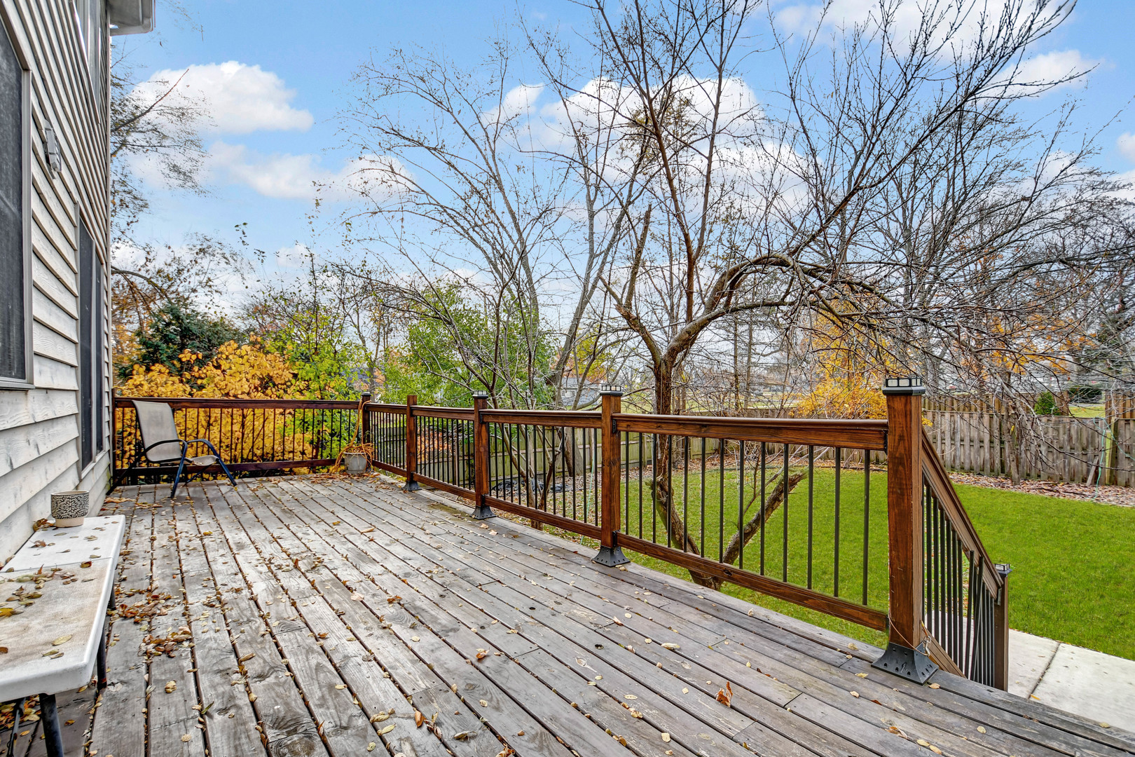 1S174 Addison Avenue Lombard, IL 60148 - Photo 31 of 37 a view of wooden deck with a trees