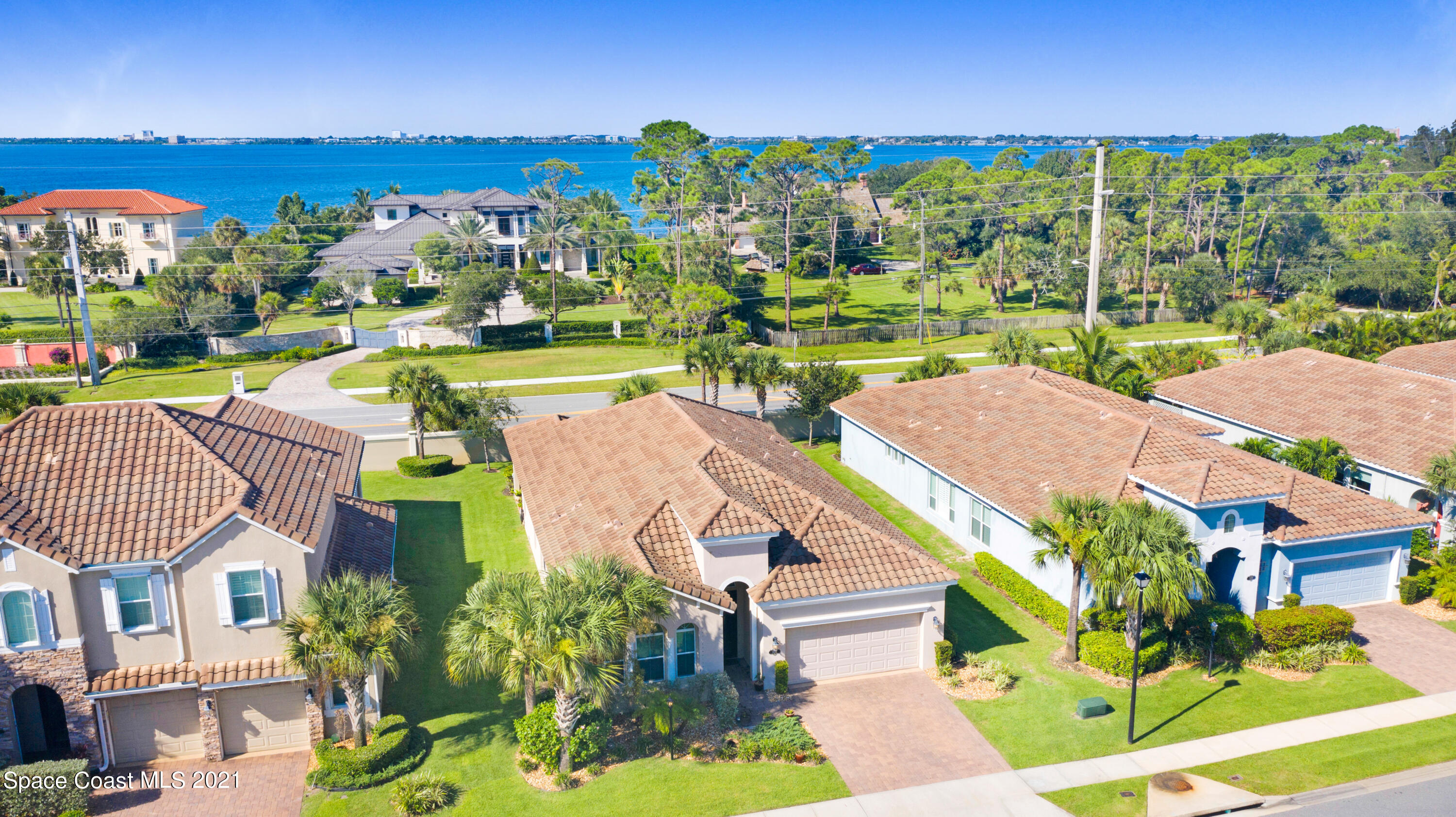 3589 Poseidon Way Indialantic, FL 32903 - Photo 3 of 3 an aerial view of a house with a swimming pool patio and outdoor seating