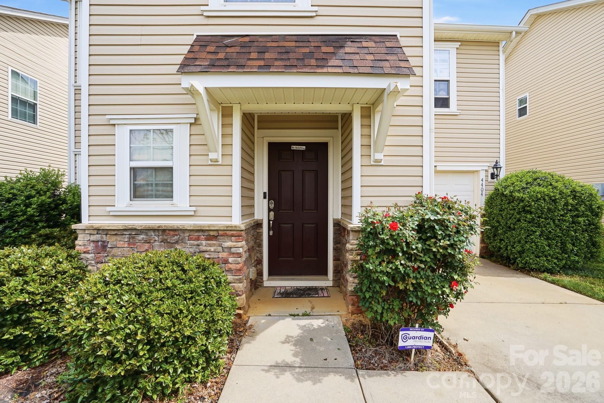 4404 Kiddle Lane Monroe, NC 28110 - Photo 2 of 48 a front view of a house with a garage