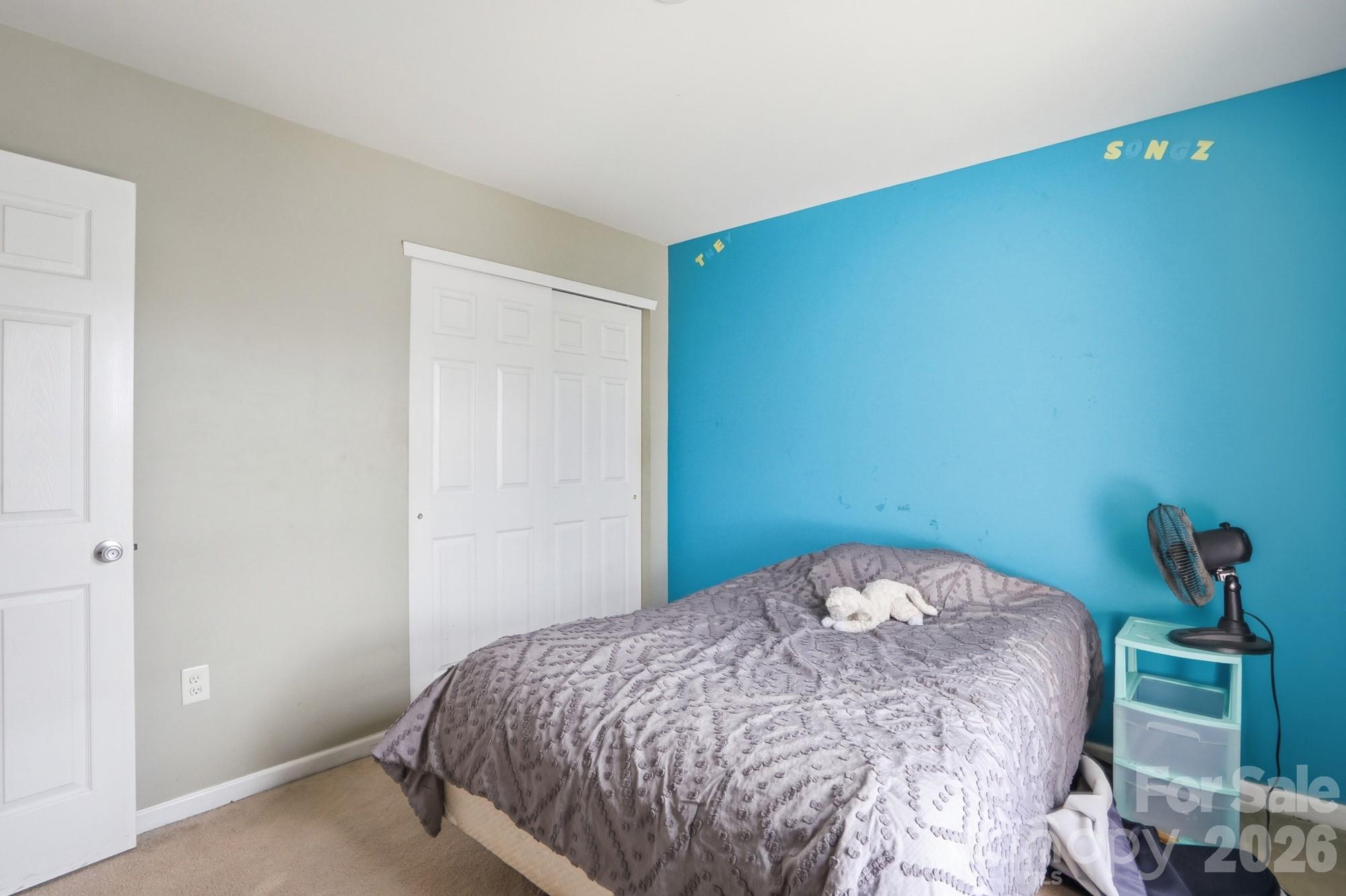 4404 Kiddle Lane Monroe, NC 28110 - Photo 36 of 48 a bedroom with a bed and a window