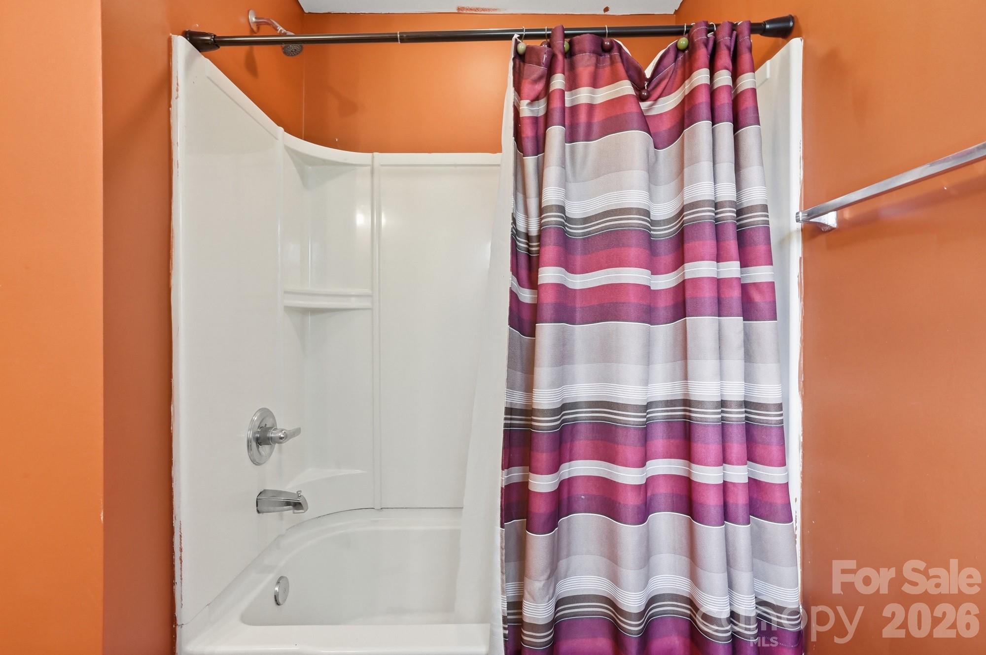 4404 Kiddle Lane Monroe, NC 28110 - Photo 38 of 48 a bathroom with a bathtub and shower