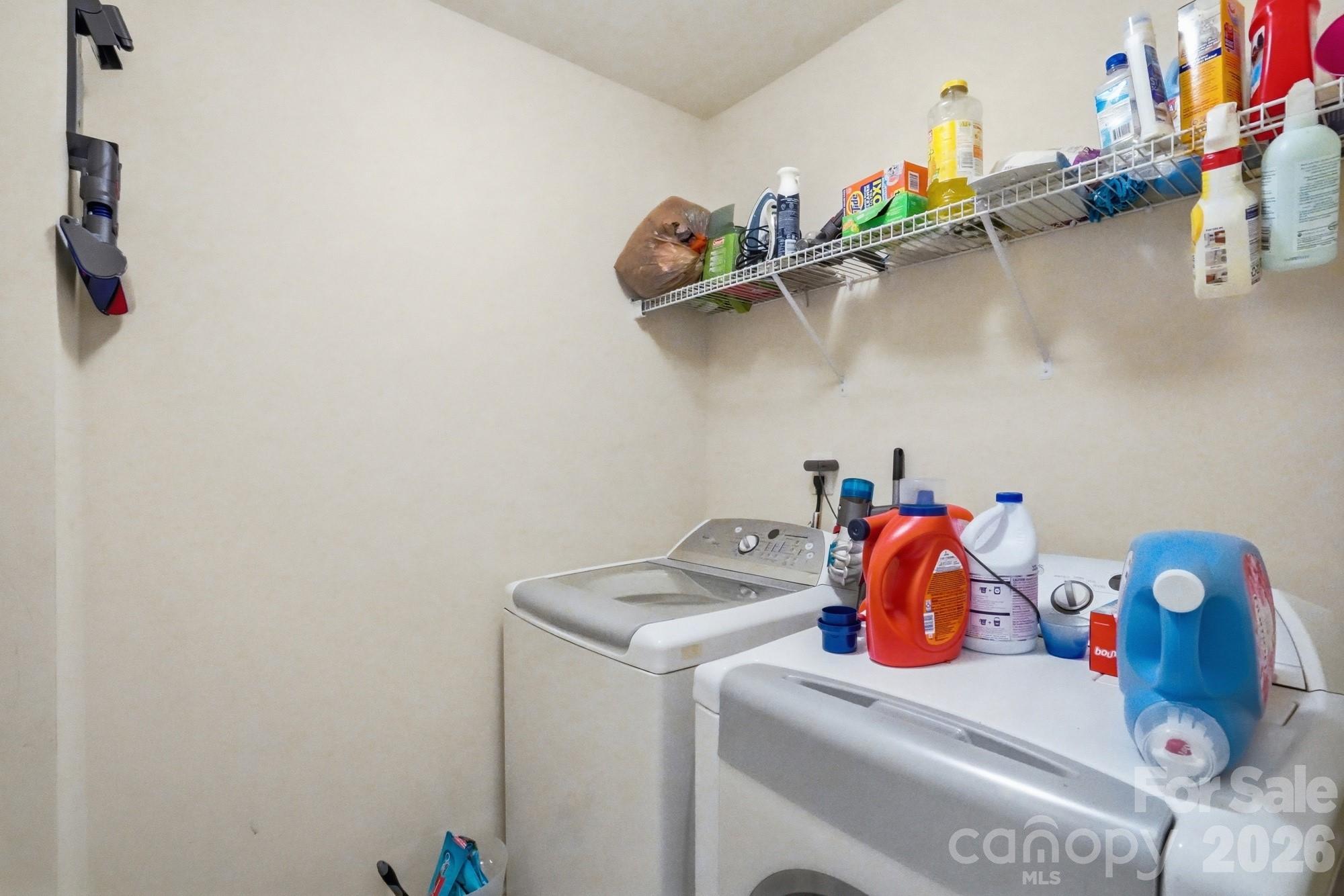 4404 Kiddle Lane Monroe, NC 28110 - Photo 39 of 48 a utility room with dryer and washer
