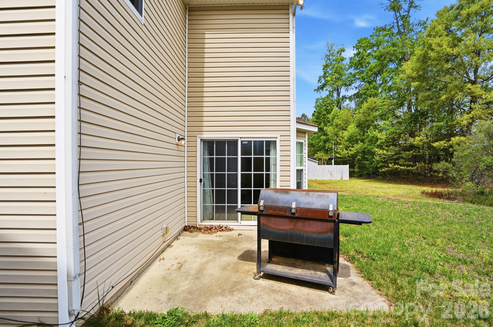 4404 Kiddle Lane Monroe, NC 28110 - Photo 42 of 48 a house view with a garden space