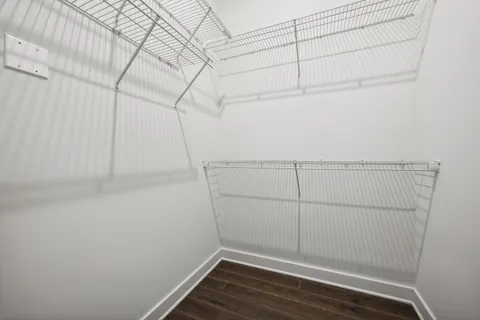 a view of a room with racks on the wall