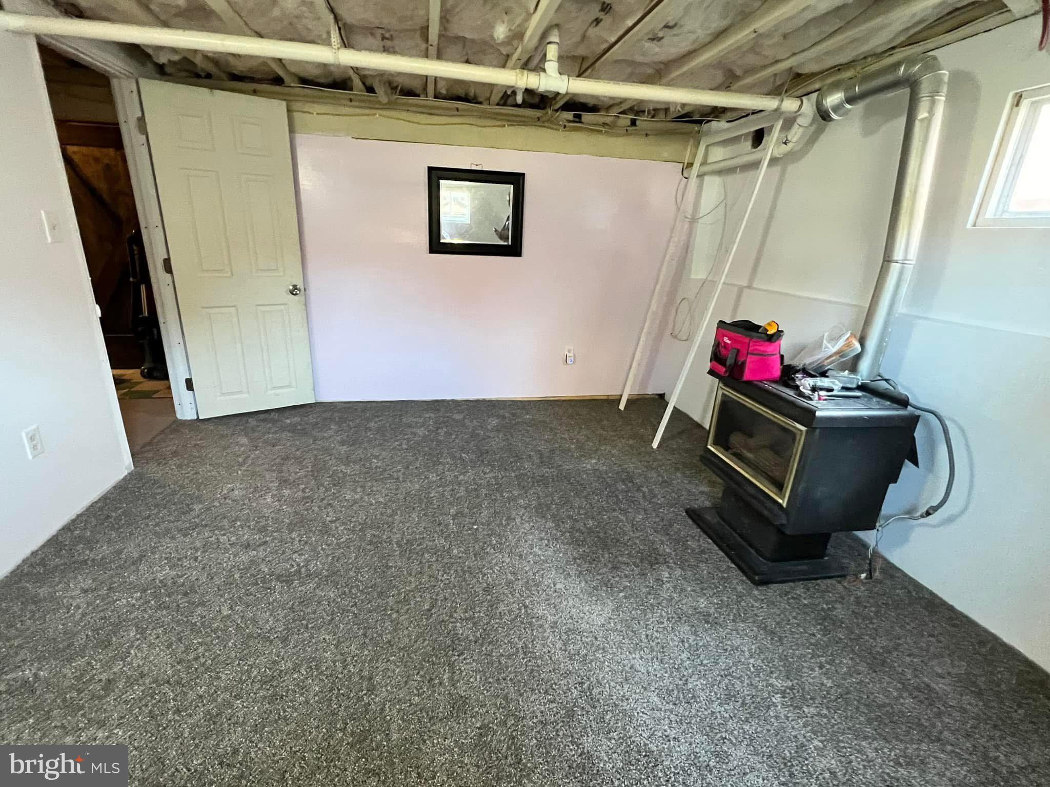 710 Mace Avenue Baltimore, MD 21221 - Photo 4 of 6 Cozy basement retreat with charm.