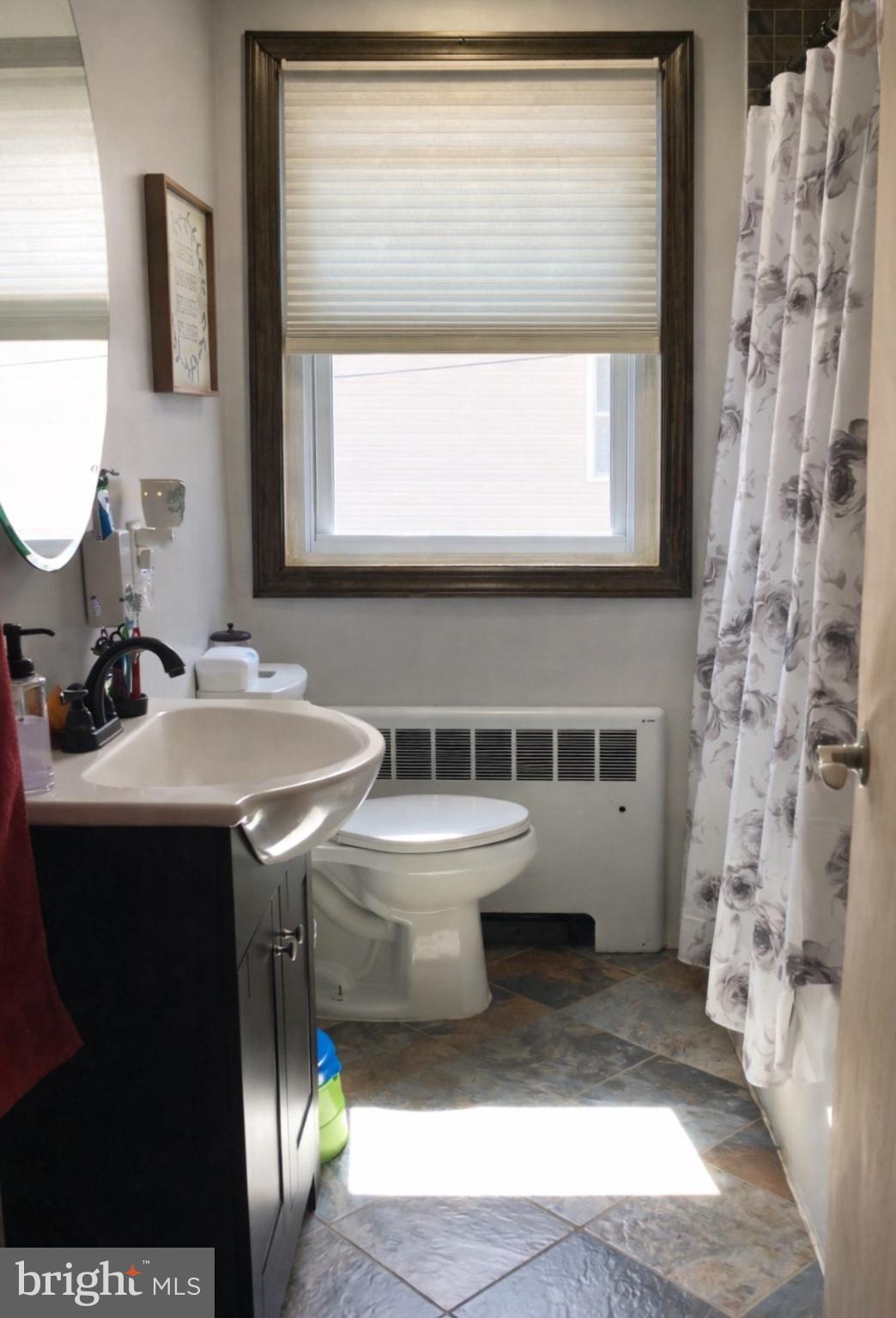 710 Mace Avenue Baltimore, MD 21221 - Photo 6 of 6 Bright and airy bathroom retreat.