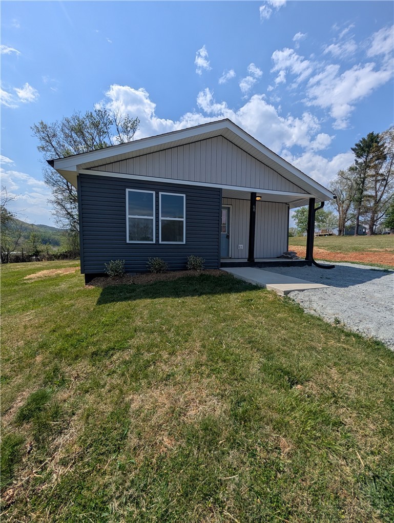 68 Estep Street Sparta, NC 28675 - Photo 21 of 21 a house that has a big yard in front of it