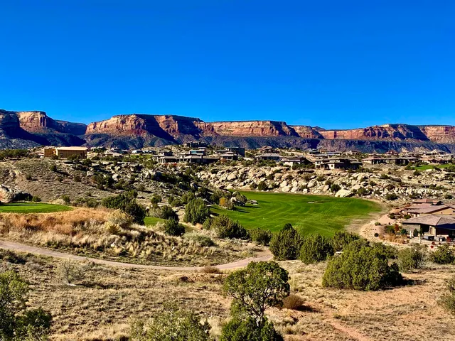 a view of a lake with a building in the background