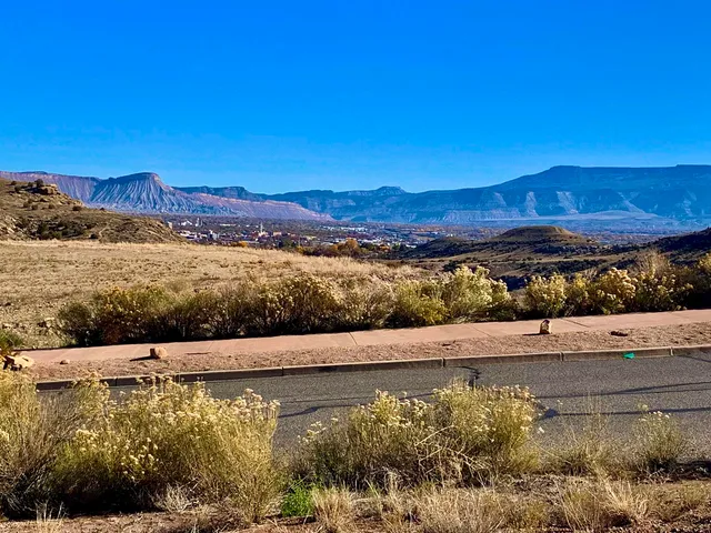 a view of an ocean and a mountain