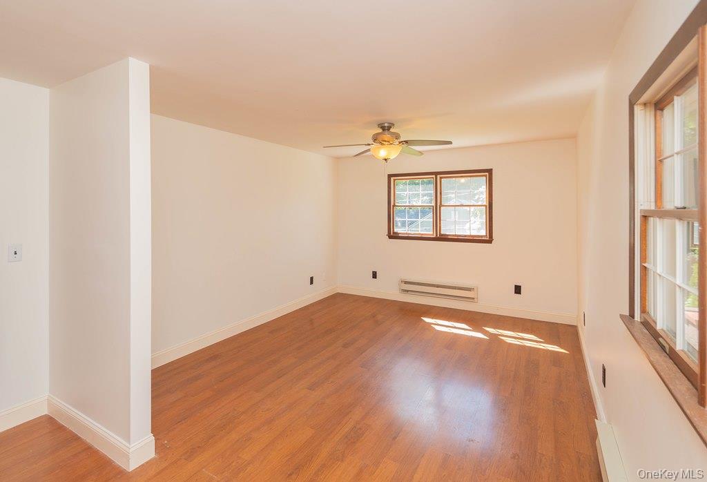 7 Harrimac Lane Putnam Valley, NY 10579 - Photo 20 of 41 a view of a room with wooden floor and window