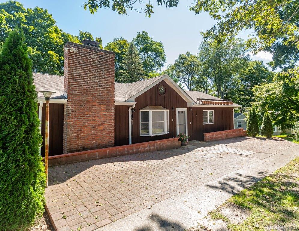 7 Harrimac Lane Putnam Valley, NY 10579 - Photo 37 of 41 a front view of a house with a yard