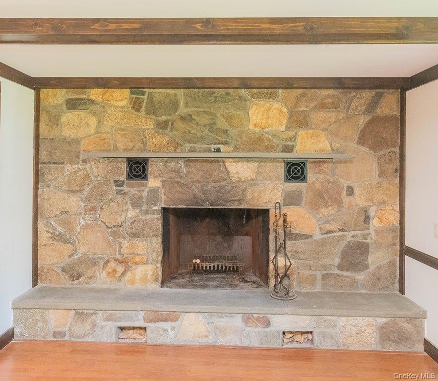 7 Harrimac Lane Putnam Valley, NY 10579 - Photo 10 of 41 a living room with a fireplace