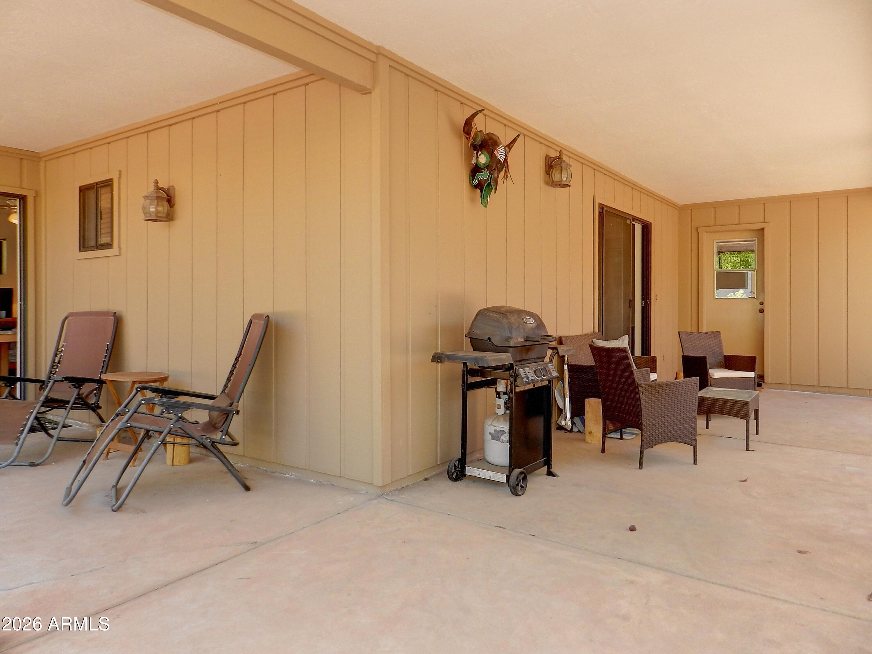 550 Barcelona Road Sedona, AZ 86336 - Photo 25 of 32 a view of a workspace with furniture and a window