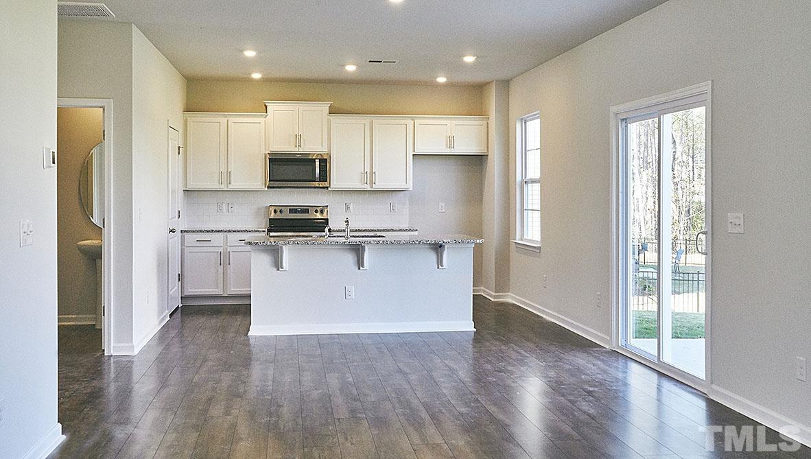 1023 Saddlebrook Drive Rocky Mount, NC 27804 - Photo 12 of 27 a view of kitchen with wooden floor and electronic appliances