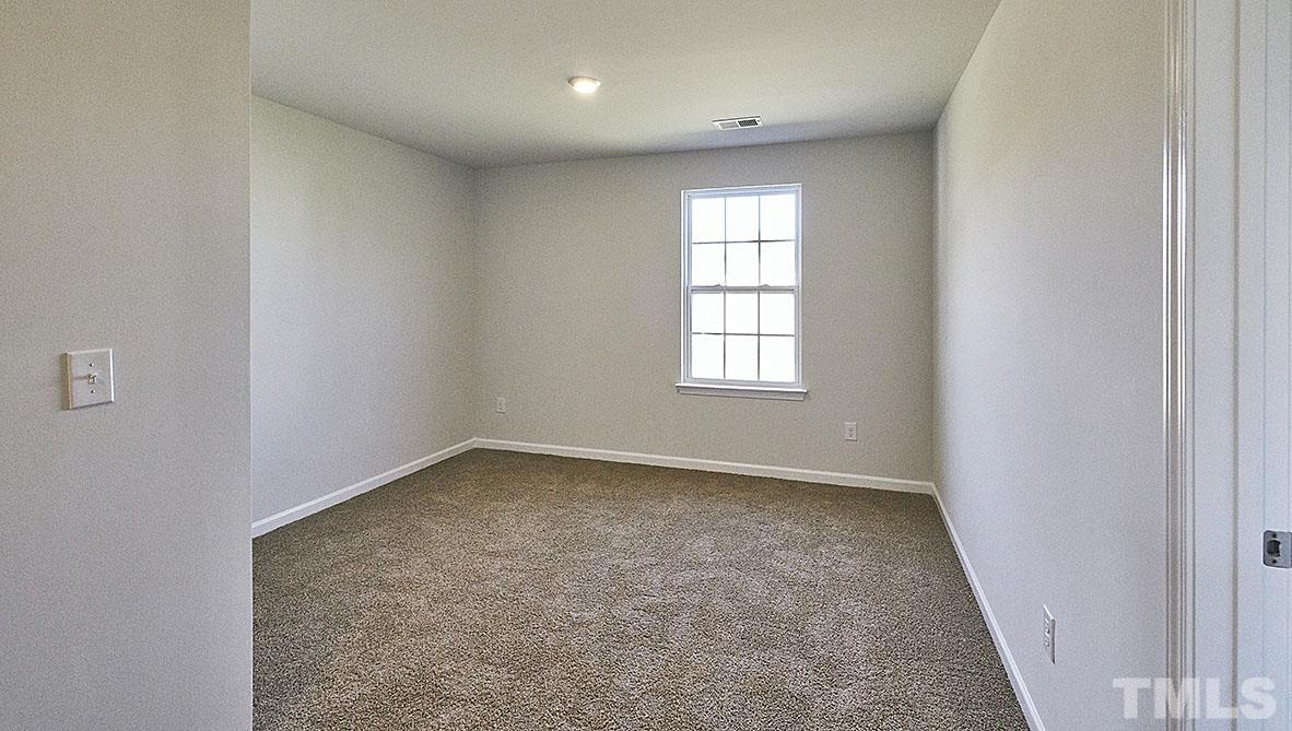1023 Saddlebrook Drive Rocky Mount, NC 27804 - Photo 13 of 27 an empty room with a window