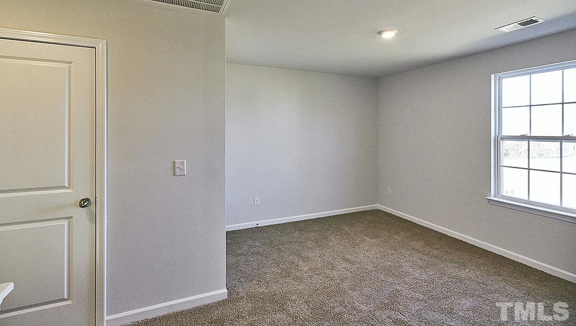 1023 Saddlebrook Drive Rocky Mount, NC 27804 - Photo 14 of 27 an empty room with windows