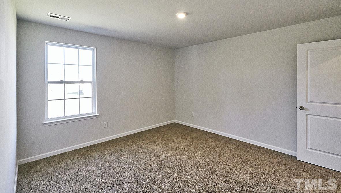 1023 Saddlebrook Drive Rocky Mount, NC 27804 - Photo 15 of 27 an empty room with windows