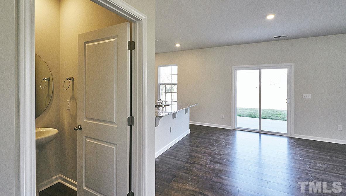 1023 Saddlebrook Drive Rocky Mount, NC 27804 - Photo 3 of 27 wooden floor with white walls