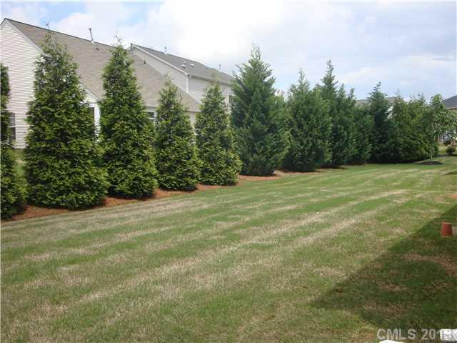 6427 Ridgeview Commons Drive Charlotte, NC 28269 - Photo 3 of 3 a view of a field with trees in the background