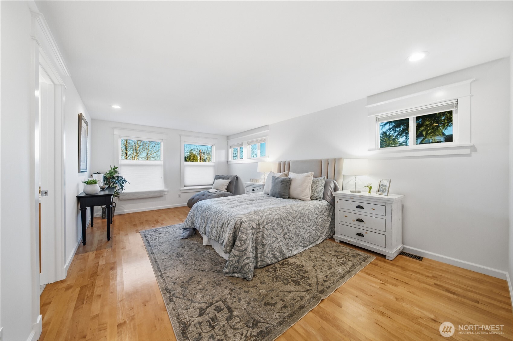 1375 32nd Avenue South Seattle, WA 98144 - Photo 21 of 36 a spacious bedroom with a bed and a dresser
