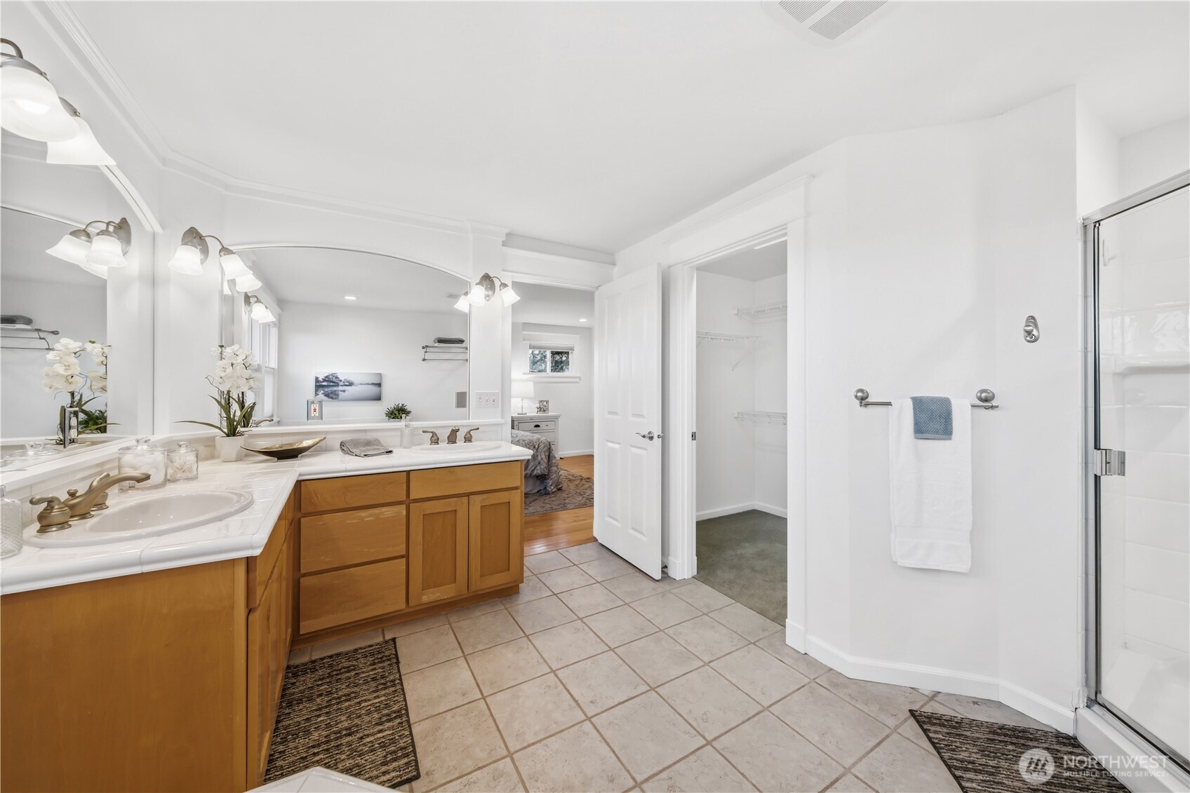 1375 32nd Avenue South Seattle, WA 98144 - Photo 24 of 36 a bathroom with a double vanity sink a mirror and a bathtub