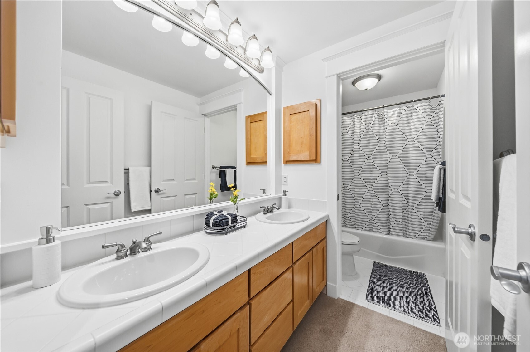 1375 32nd Avenue South Seattle, WA 98144 - Photo 28 of 36 a bathroom with a double vanity sink mirror and double