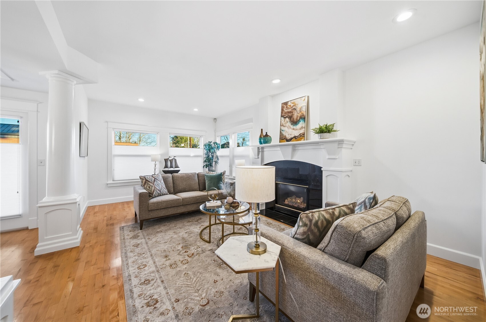 1375 32nd Avenue South Seattle, WA 98144 - Photo 4 of 36 a living room with furniture a fireplace and a window