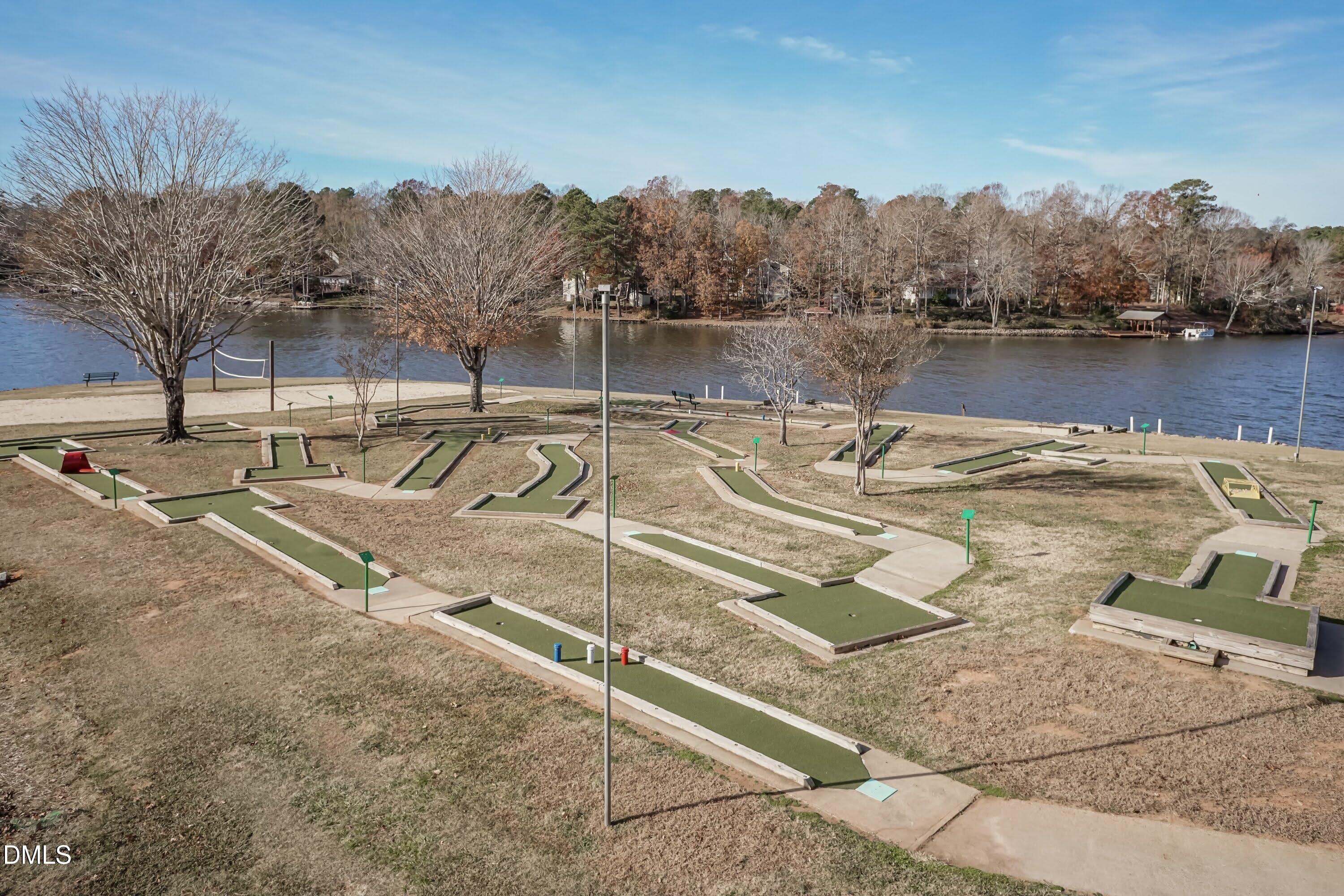 104 Buffalo Drive Spring Hope, NC 27882 - Photo 48 of 48 a view of a swimming pool with a lake view