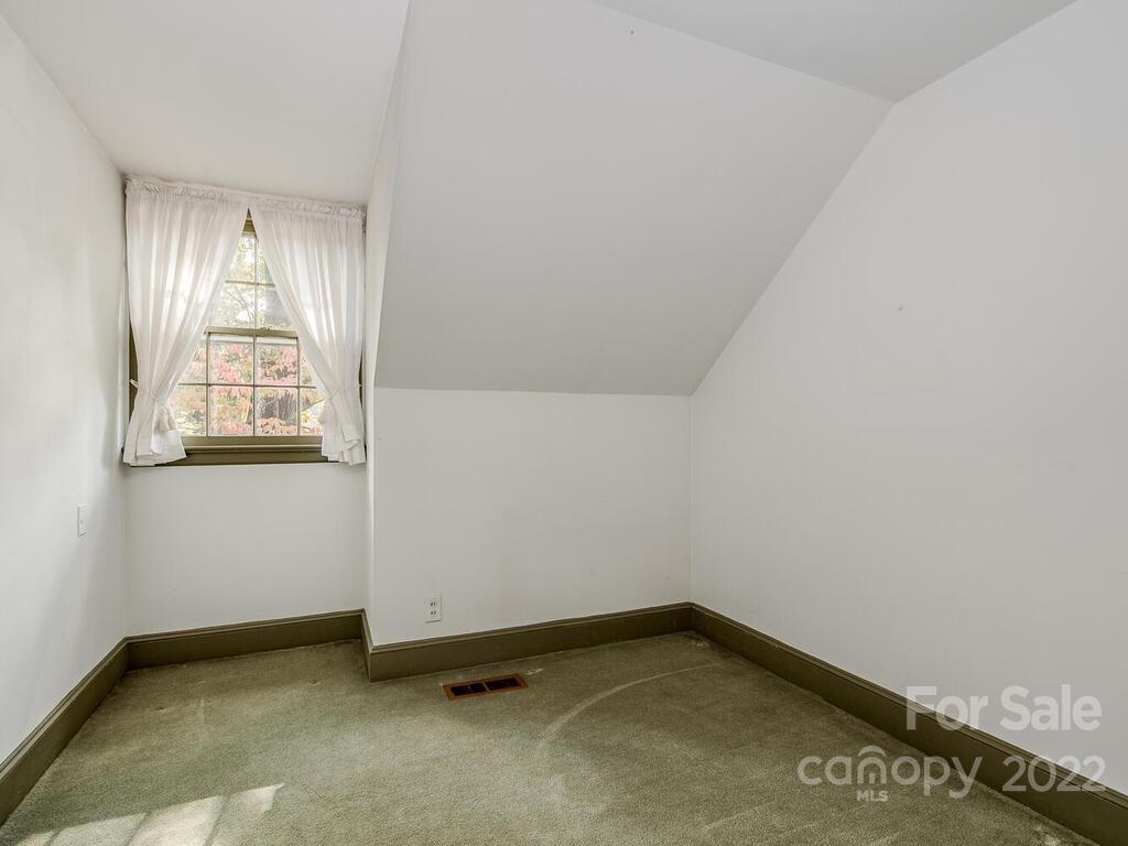 627 Sandridge Road Charlotte, NC 28210 - Photo 13 of 19 an empty room with windows