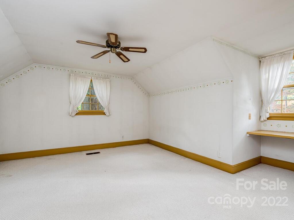 627 Sandridge Road Charlotte, NC 28210 - Photo 17 of 19 a view of a room with gym equipment