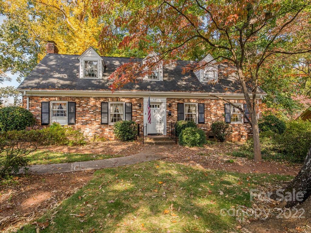 627 Sandridge Road Charlotte, NC 28210 - Photo 2 of 19 front view of house with a yard
