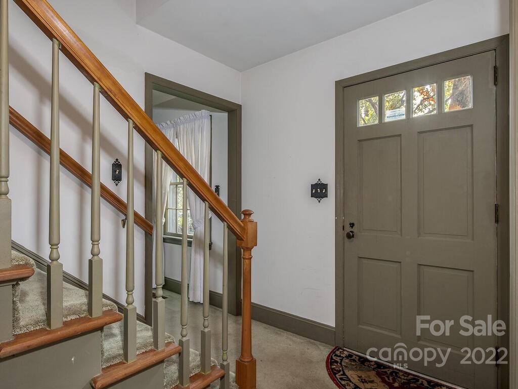 627 Sandridge Road Charlotte, NC 28210 - Photo 4 of 19 a view of an entryway with wooden floor