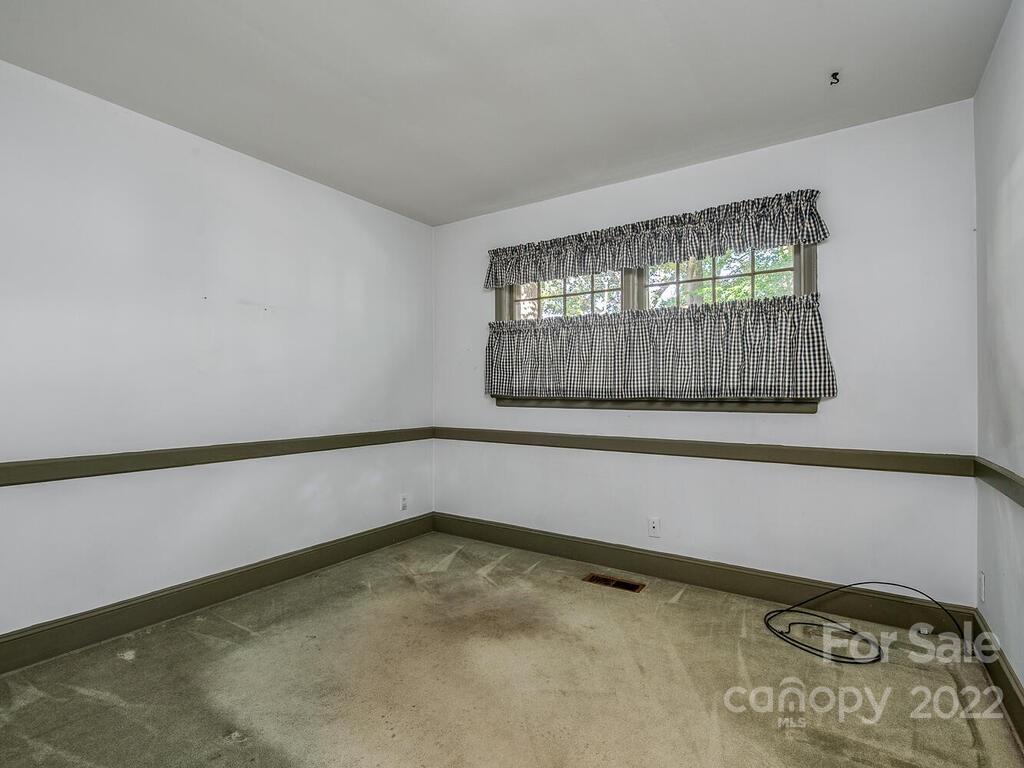 627 Sandridge Road Charlotte, NC 28210 - Photo 7 of 19 a view of an empty room