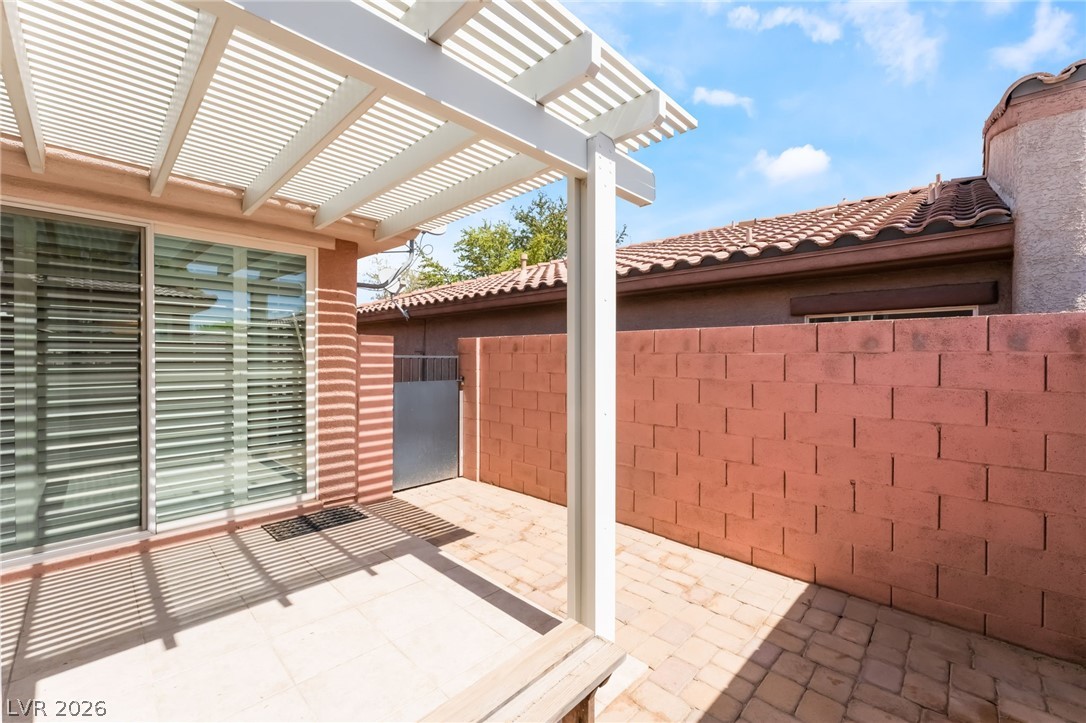 10481 Riverside Park Avenue Las Vegas, NV 89135 - Photo 35 of 51 View of patio / terrace with a pergola