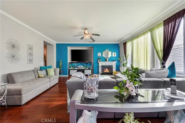 a fireplace with painting on the wall and a fireplace