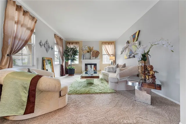 a view of a hallway with wooden floor and entryway