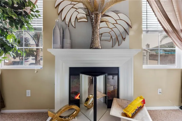 a bedroom with a bed lamps and window