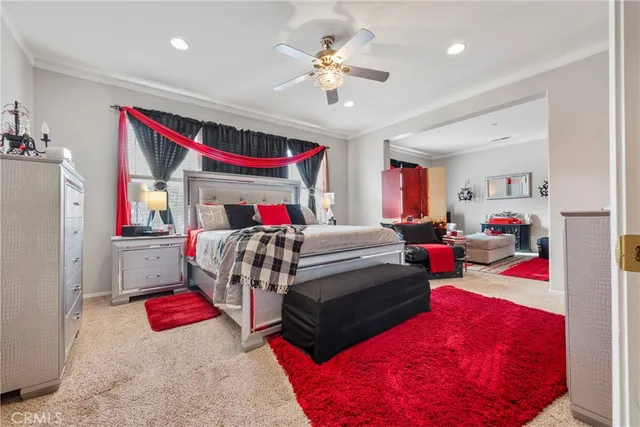 a front view of a house with swimming pool and furniture