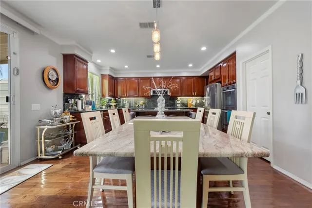 a view of a dining room with furniture